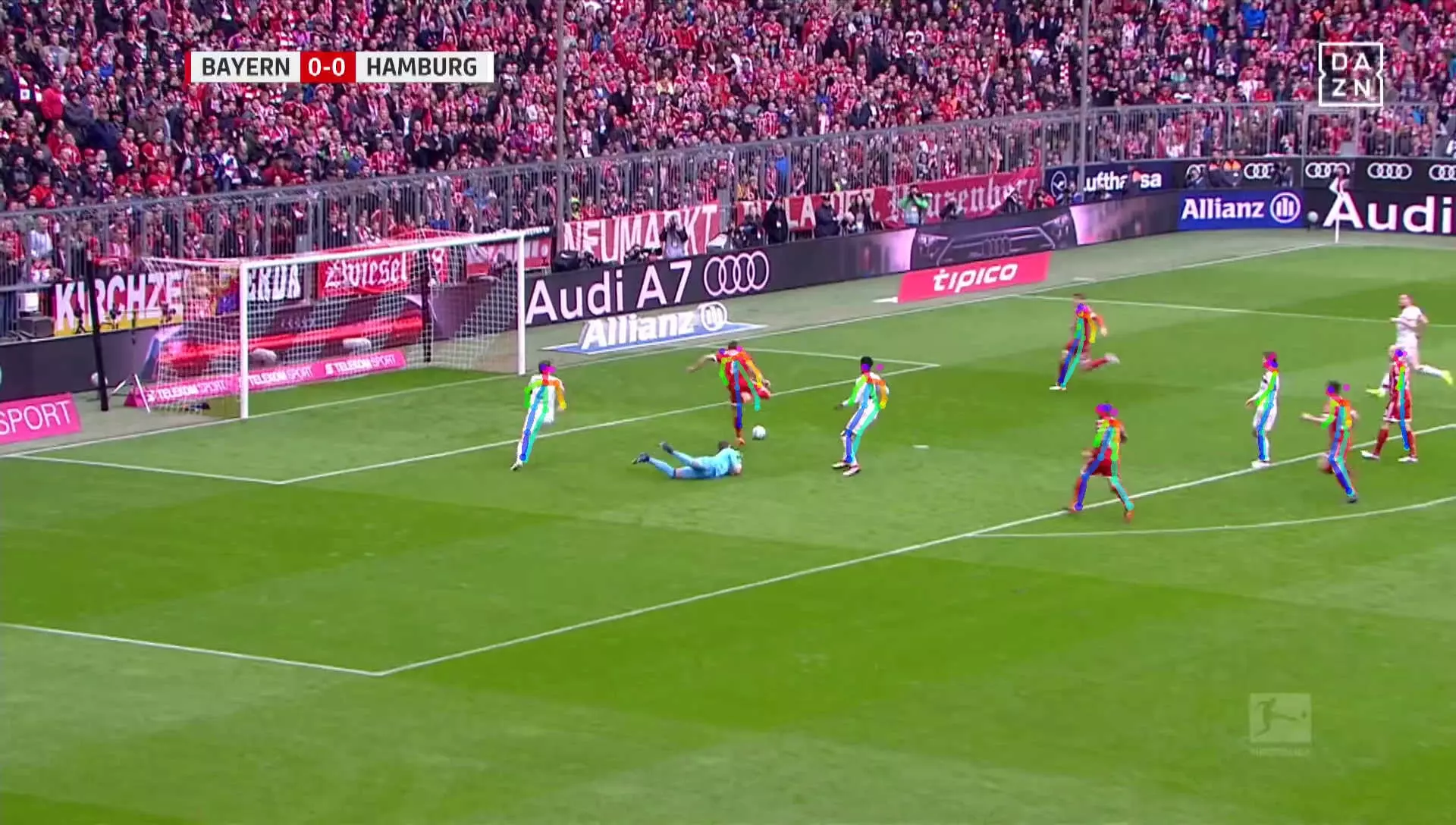 A Bayern Munich player about to score a goal against Hamburg during a Bundesliga (German Football Division One) game. On the image lines have been drawn that show the pose of all the players. The word pose in this case refers to a line drawing of the skeleton of each player.