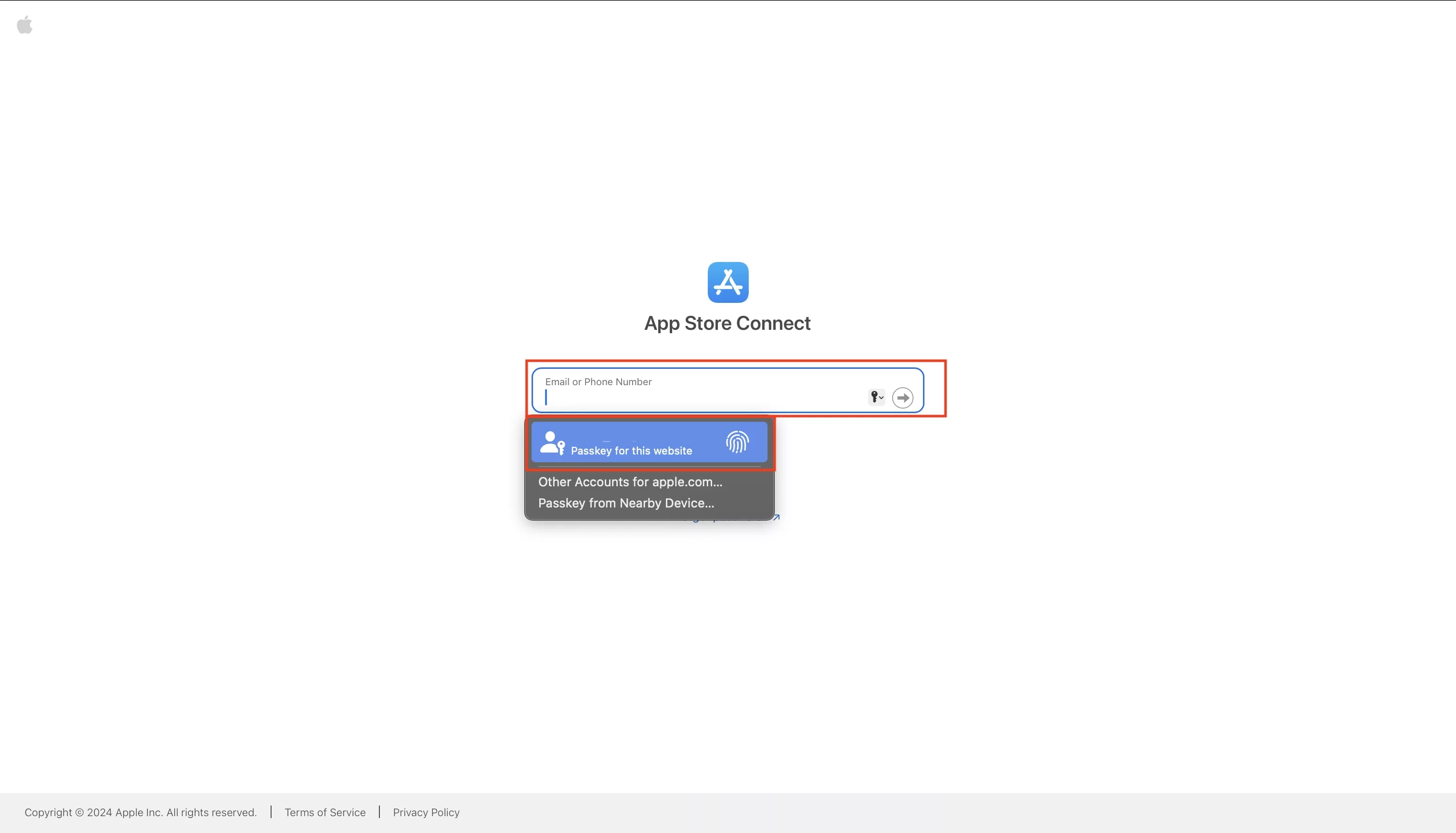 A screenshot of AppStoreConnect showing that if we press the email field we can use a passkey from the Apple password manager. Use the biometric sensor to activate it.