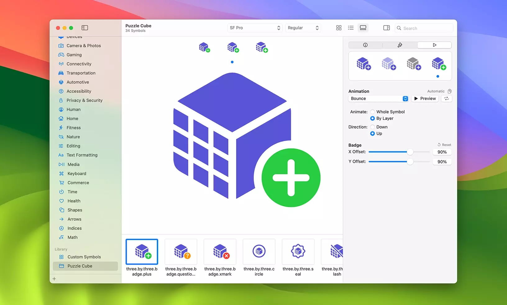 A screenshot of the SF Symbols software showing a sample grid of new symbols in white.